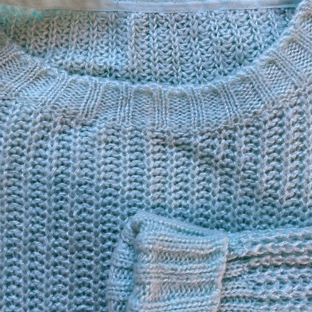 Women’s knit crop-top sweater.